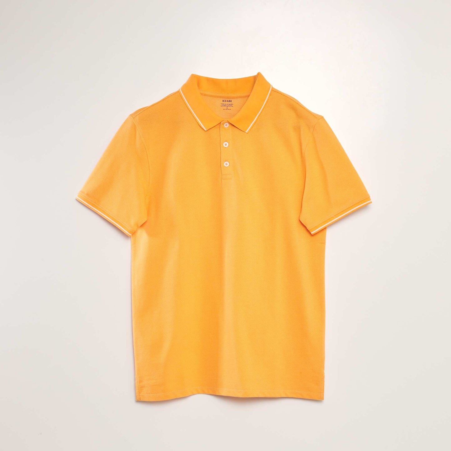 Polo en piqué de coton effet moucheté Orange