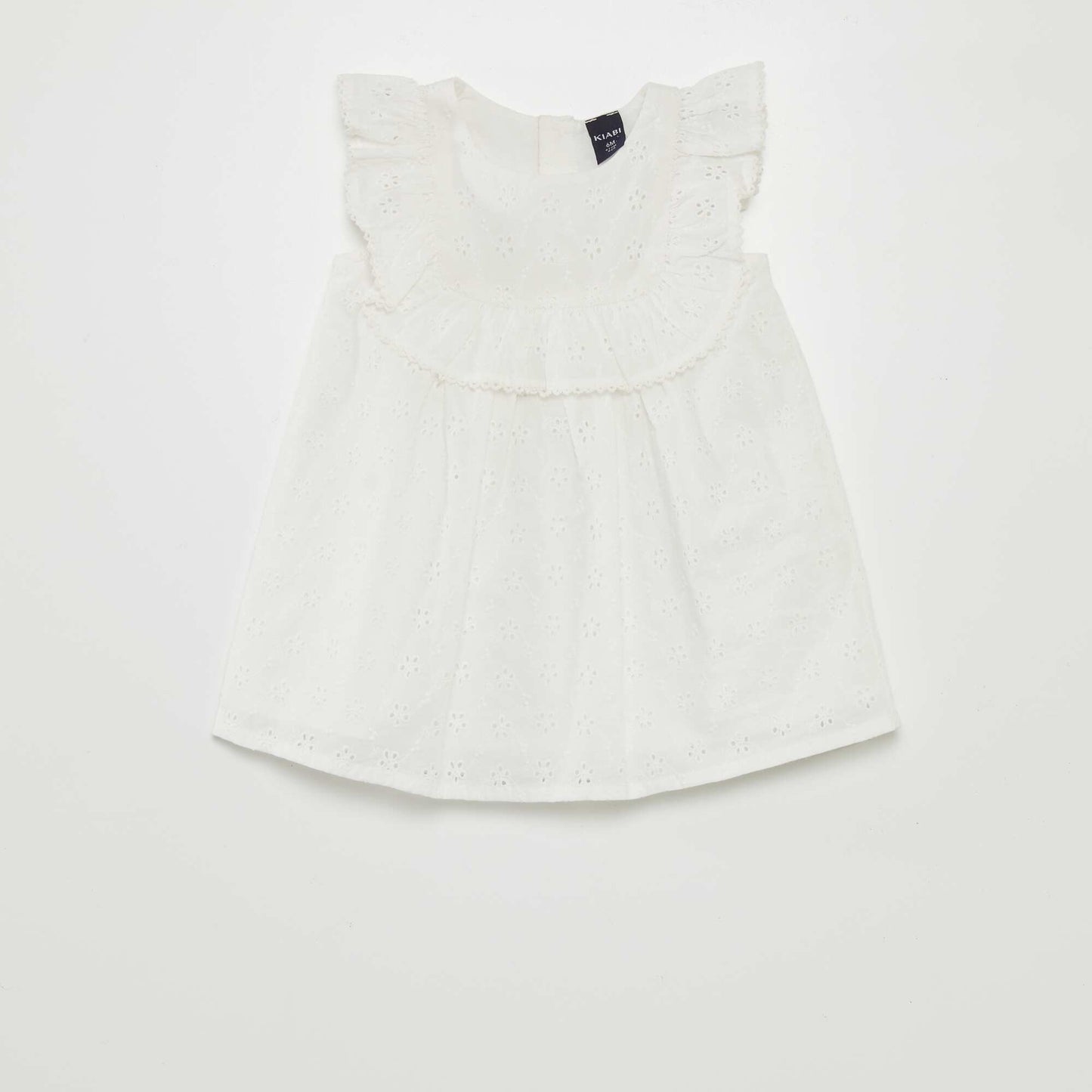 Robe avec broderies anglaises et volant blanc