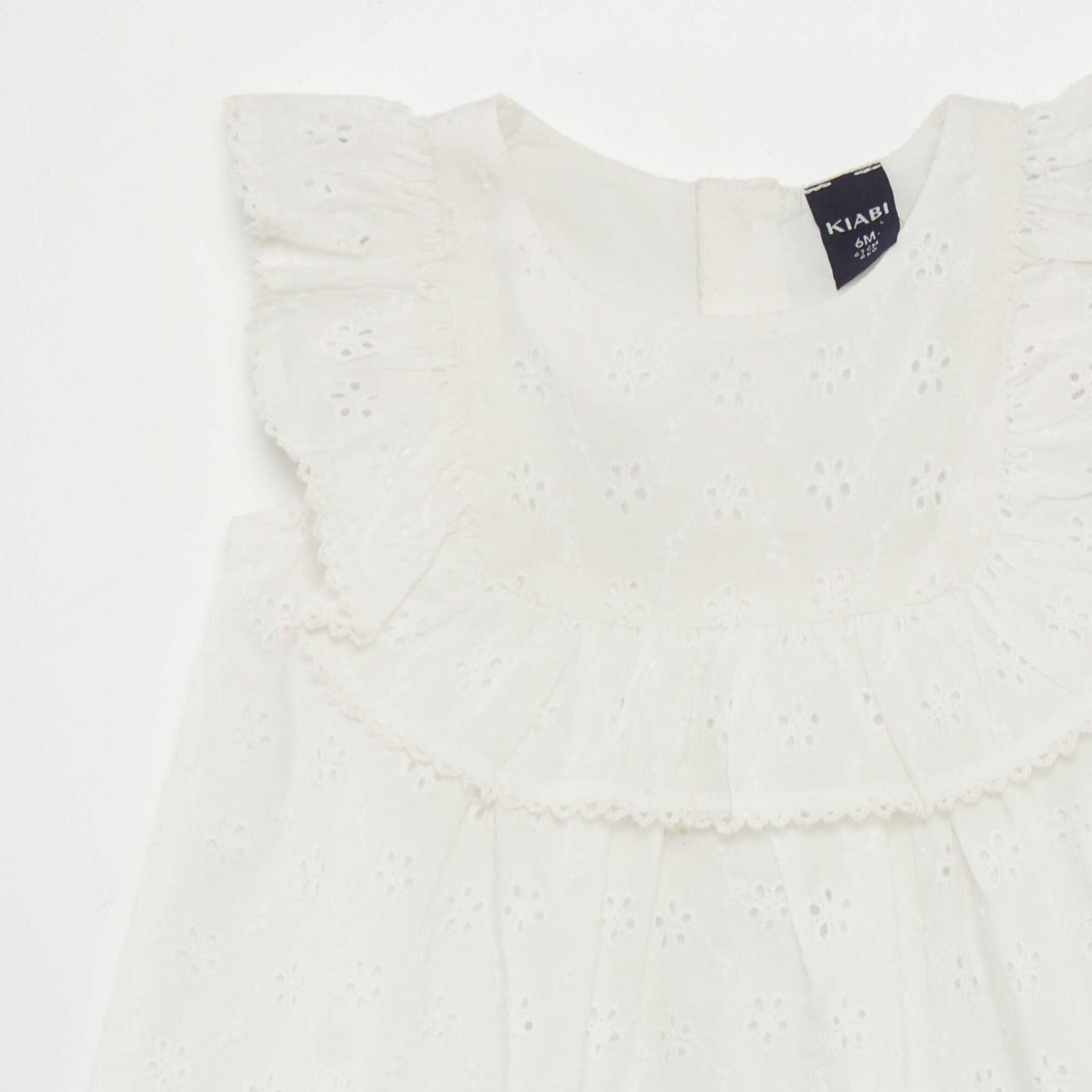 Robe avec broderies anglaises et volant blanc