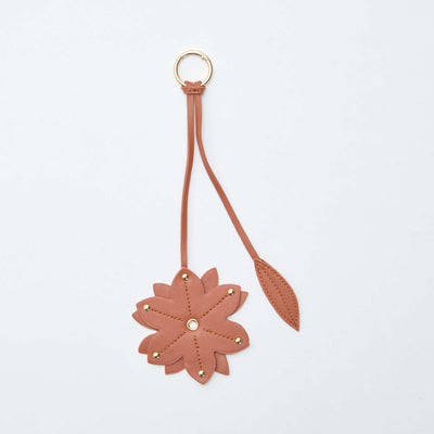 Porte-clé fleur en simili CAMEL