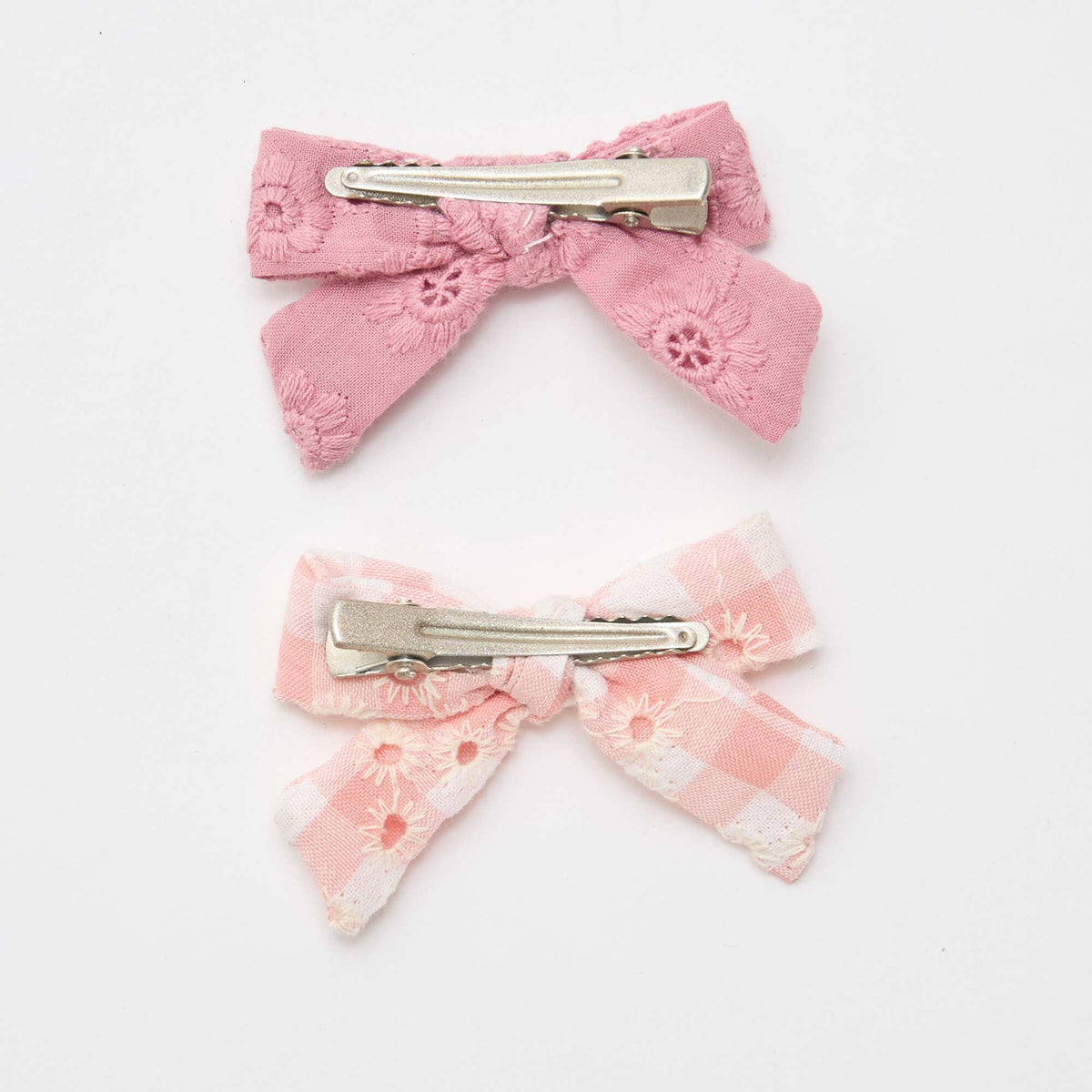 Lot 2 pinces croco à noeud ROSE