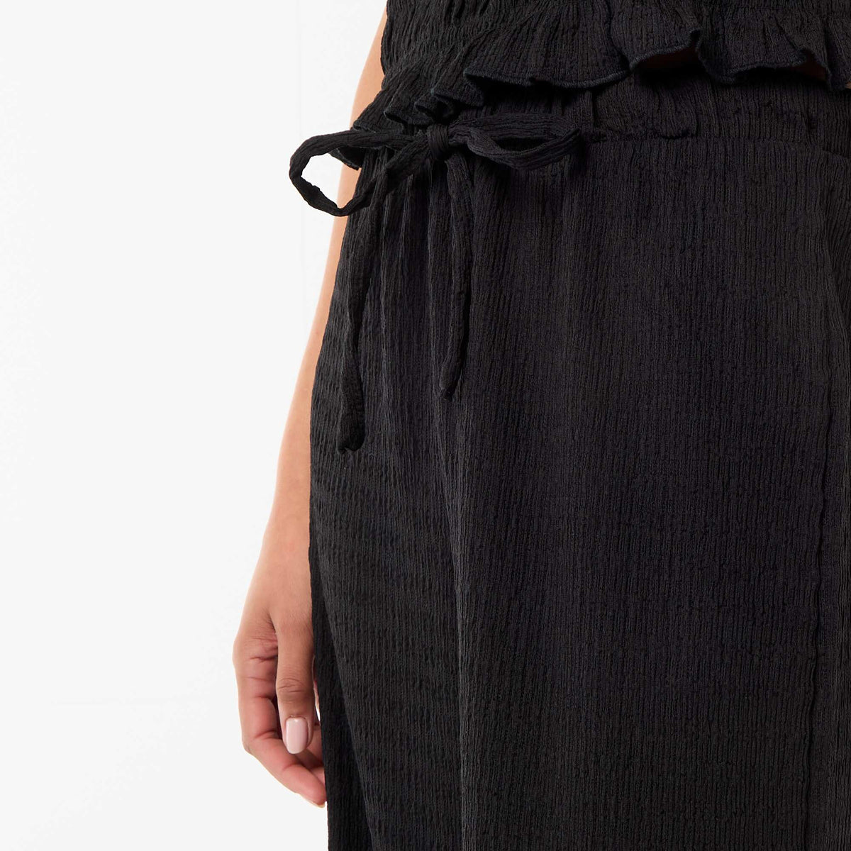 Pantalon large en maille smockée NOIR