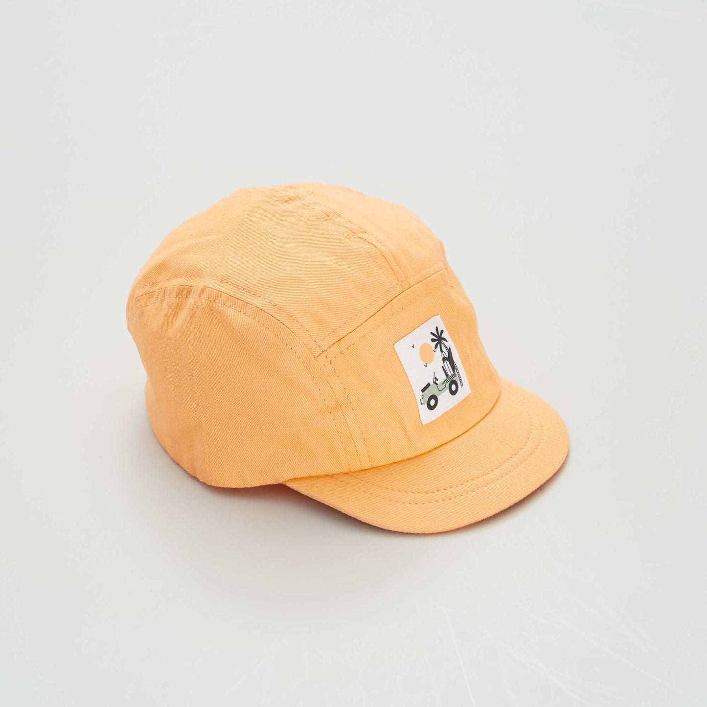 Casquette avec écusson orange abricot